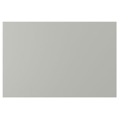 Une façade rectangulaire gris clair d’armoire de cuisine HAVSTORP. La surface lisse et laquée assure un nettoyage facile et un look moderne.