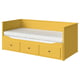 Lit de jour multifonctionnel HEMNES jaune vif avec tiroirs et matelas, parfait pour les petits espaces.
