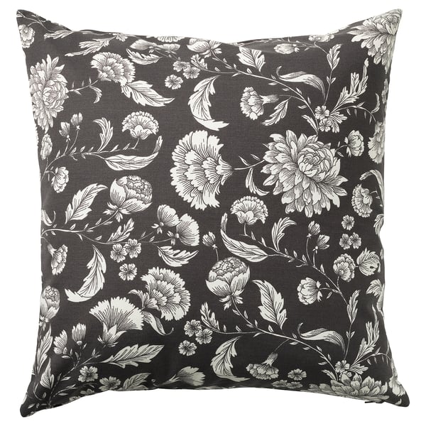 Coussin IDALINNEA, noir avec motif floral blanc, forme carrée, matière en coton.