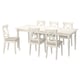 Un ensemble de salle à manger INGATORP blanc avec une table extensible et six chaises, avec des sièges rembourrés.