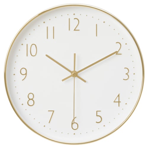 Horloge ronde blanche à cadre doré avec aiguilles et chiffres dorés. Mouvement à quartz silencieux ; Design élégant et moderne.