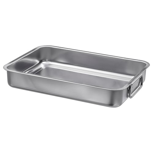 Un plat à rôtir en acier inoxydable KONCIS avec poignées, conçu pour une utilisation au four et au barbecue.