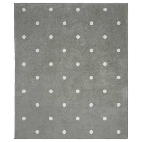 Tapis carré gris à pois blancs, en polyester recyclé. Doux, durable et antidérapant.
