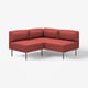 Canapé modulaire d’angle LILLEHEM en tissu canonné couleur terre cuite, avec un design minimaliste avec des pieds métalliques élégants et une forme angulaire.