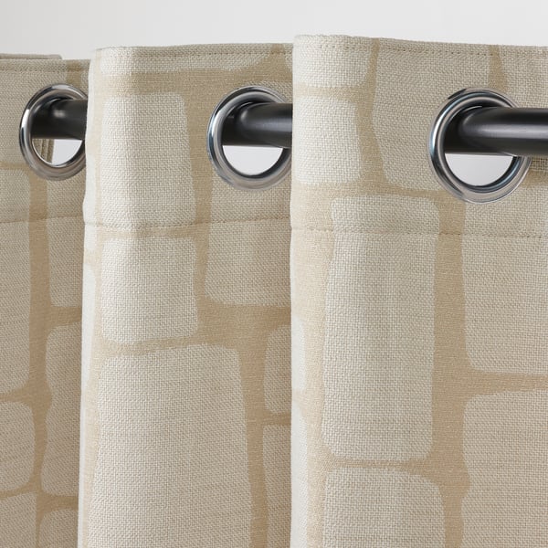 Le rideau avec œillets glisse en douceur, bloque la lumière, motif jacquard élégant.