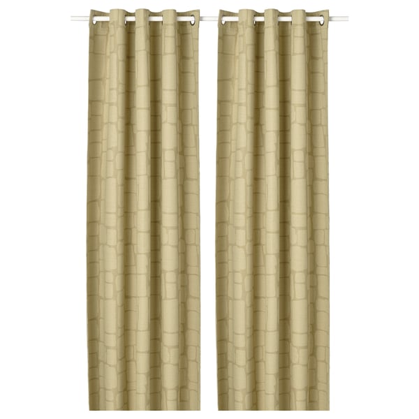 Deux rideaux tissés en jacquard beige avec des motifs verticaux et un dessus à œillets, offrant une fonctionnalité de blocage.