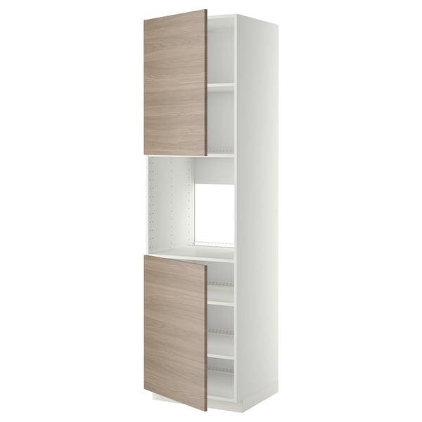 Une armoire de cuisine METOD blanche avec des portes à motifs de noyer, dotée d’étagères réglables et d’une porte qui peut s’ouvrir dans les deux sens.