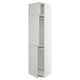 Armoire de cuisine METOD blanche avec façades en lerhyttan gris clair. Modèle haut, rectangulaire, à deux portes avec bords biseautés.