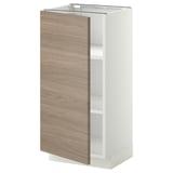 Une armoire de cuisine METOD moderne, blanche avec une porte à motif de noyer, une construction robuste et des étagères réglables.