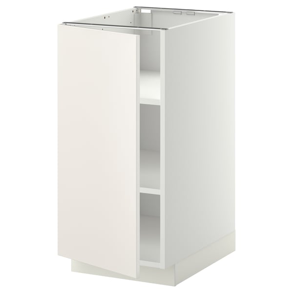 Une armoire de cuisine METOD blanche au design lisse, dotée d’étagères réglables et de charnières à encliquetage, idéale pour les cuisines modernes.