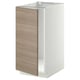 Armoire de cuisine METOD à motifs de bois, cadre rectangulaire et robuste, façade en plastique à motif noyer.