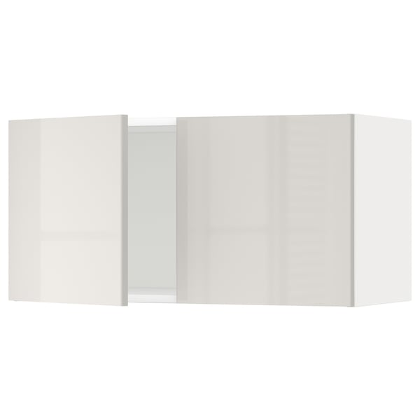 Une armoire de cuisine blanche et moderne avec une finition brillante.