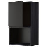 Armoire de cuisine noire avec porte ouverte mettant en valeur le rangement. Design moderne, finition mate.