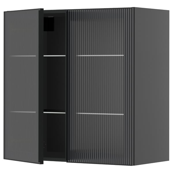 Armoire murale METOD noire moderne avec des portes en verre texturé et des cadres métalliques élégants.