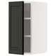 Armoire de cuisine METOD noire avec intérieur blanc et étagère réglable, forme rectangulaire.