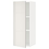 Une armoire murale de cuisine METOD blanche avec une finition brillante, une forme rectangulaire et une porte unique. Il y a une étagère réglable à l’intérieur.