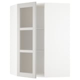 Armoire d’angle METOD blanche avec étagères réglables.
