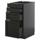 Tiroirs en frêne teinté noir dans une armoire de cuisine moderne, avec des bords biseautés et un design élégant.