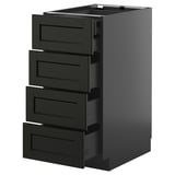 Unité de cuisine moderne noire avec quatre tiroirs ouverts, poignées élégantes, finition en bois foncé, forme rectangulaire.