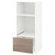 Une armoire de cuisine METOD blanche avec un tiroir en chêne clair, une forme carrée et un design moderne.