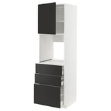 Unité de cuisine blanche moderne avec tiroirs et armoire noirs, design élégant.