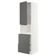 Une armoire de cuisine METOD blanche avec des tiroirs et des portes voxtorp gris foncé. Il a un design moderne et élégant avec des poignées intégrées.