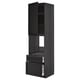 Armoire noire METOD avec porte ouverte, deux tiroirs et étagère réglable, design moderne et élégant.