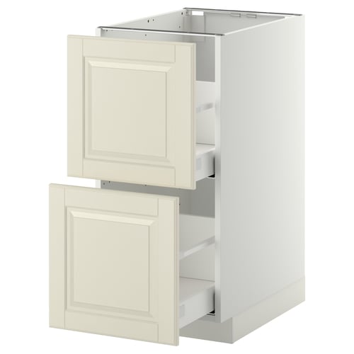 Un meuble de cuisine METOD blanc avec deux tiroirs bodbyn blanc cassé, avec des bords biseautés et un design traditionnel.