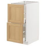 Armoire blanche moderne avec tiroirs en chêne, design épuré, rangement efficace.