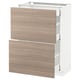 Un meuble de cuisine IKEA METOD avec deux tiroirs de couleur bois clair et un cadre blanc, doté d’un design élégant et minimaliste.