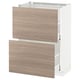 Armoire de cuisine METOD blanche avec tiroirs en bois, finition brun clair, système IKEA.