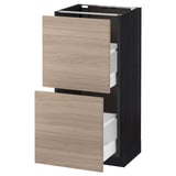 Cette image montre un meuble à tiroirs ouvert brun clair de la série de cuisines METOD, doté de deux tiroirs entièrement allongés et d’un design élégant et moderne.