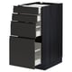 Armoire de cuisine noire moderne avec quatre façades de tiroirs mats, design élégant et mince, avec poignées intégrées.