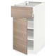 Une armoire de cuisine blanche avec un tiroir et une porte à motif de noyer brun clair, dotée d’un design moderne aux lignes épurées et d’un cadre robuste.