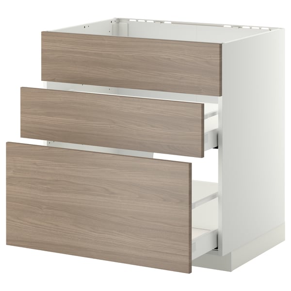 Un meuble de cuisine IKEA METOD avec trois tiroirs à motifs de noyer, doté d’un design moderne et élégant.