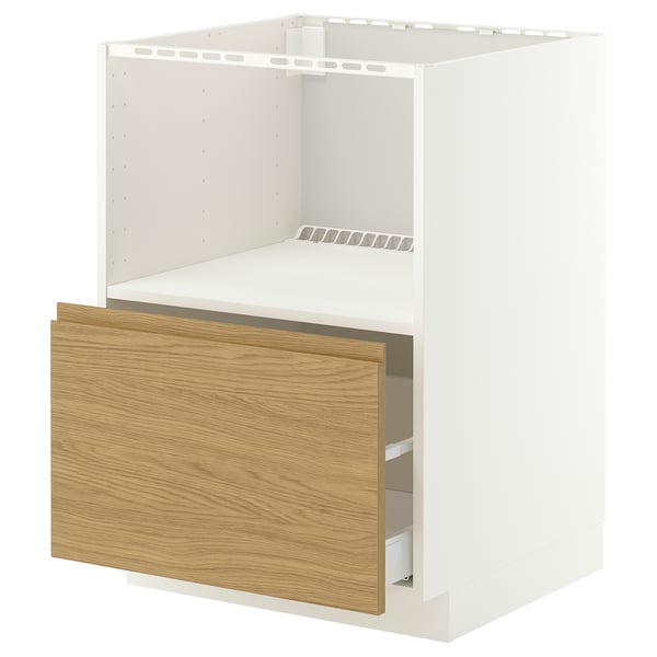 Armoire de cuisine IKEA METOD blanche avec tiroir en bois, partiellement ouverte.