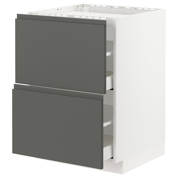 Armoire de cuisine moderne avec tiroirs gris foncé et cadre blanc. Design rectangulaire élégant avec poignées intégrées.
