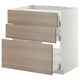 Armoire de cuisine METOD avec 3 tiroirs coulissants en bois, partiellement ouverts.