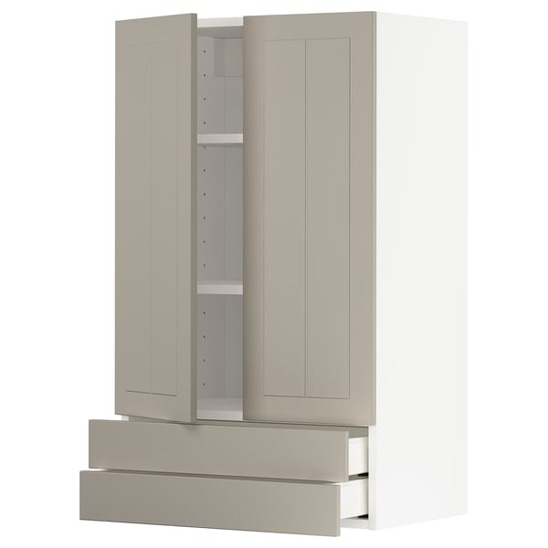 Un meuble de cuisine METOD beige avec des armoires et des tiroirs, doté d’un design moderne et d’un aspect artisanal.
