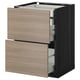Armoire de cuisine METOD avec tiroirs brun clair et cadre foncé, design élégant et moderne.