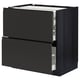 Armoire de cuisine noire METOD avec tiroirs ouverts, design moderne.