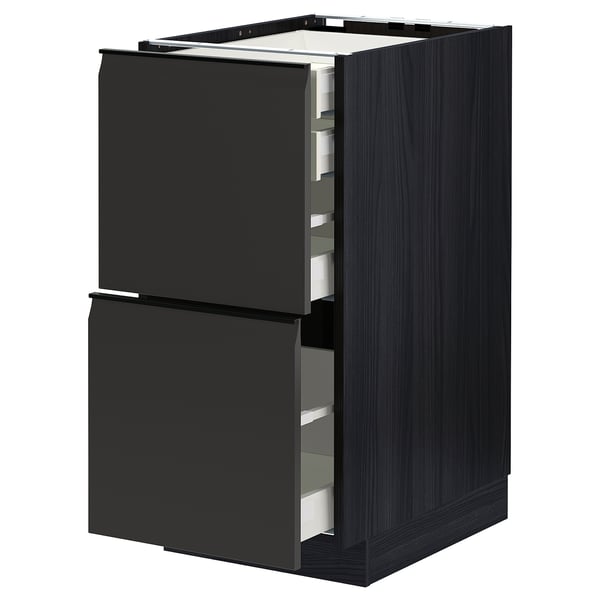 Armoire de cuisine noire avec deux grands tiroirs et poignées intégrées.