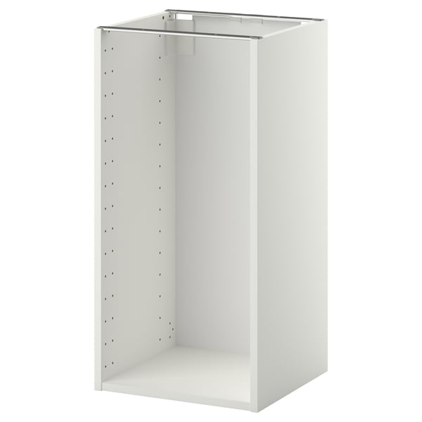 Armoire de cuisine ikea METOD blanche, rectangulaire avec un design plat et des trous pré-percés pour les étagères.