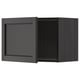 Armoire murale moderne en bois noir avec porte carrée et bords biseautés.