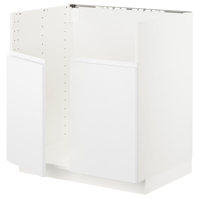 Unité de cuisine blanche METOD, design minimaliste moderne, cadre robuste, lignes épurées, finition mate.