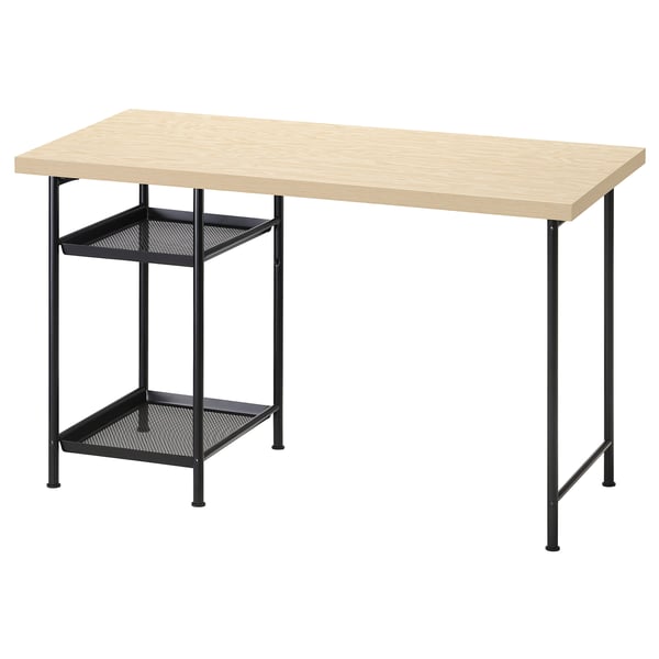 Le bureau MITTCIRKEL est doté d’un plateau en bois clair et de pieds en métal noir avec étagères. Il est conçu pour le stockage et la gestion des câbles.
