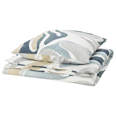Ensemble de couette pliée à motifs bleus et blancs, avec motifs de feuilles, avec mélange de coton et de viscose.