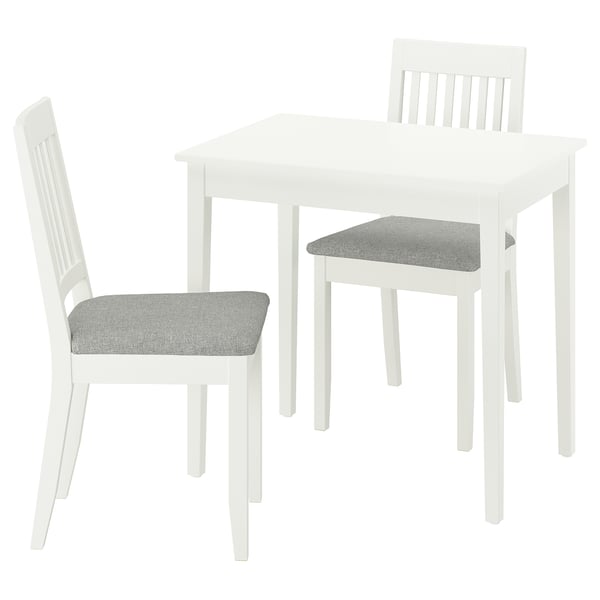Un ensemble de salle à manger NÄSINGE blanc avec une table carrée et deux chaises rembourrées. Design simple et moderne, parfait pour les petits espaces.