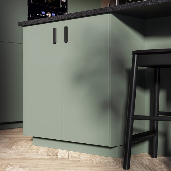 Meuble de cuisine moderne en gris-vert avec un design élégant et une surface lisse.