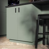 Meuble de cuisine moderne en gris-vert avec un design élégant et une surface lisse.